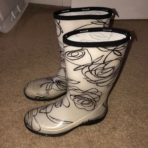 Black and white rain boots